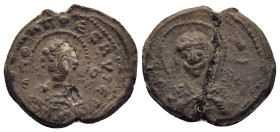 BYZANTINE LEAD SEAL. (22mm, 6 g) Obv: Nimbate bust of Saint. Rev: Nimbate bust of Virgin Mary.