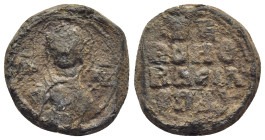 BYZANTINE LEAD SEAL. (19mm, 7.58 g) Obv: MP - ΘV. Nimbate bust of Mary on chest medallion with face of Christ. Rev: Legends in 4 lines.