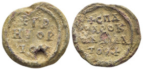 BYZANTINE LEAD SEAL. (23mm, 9.9 g) Obv: Legend in 3 lines. Rev: Legend in 4 lines.