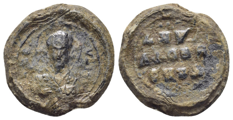 BYZANTINE LEAD SEAL. (21mm, 7.7 g) Obv: Bust of Saint facing. Rev: Legends in 3 ...