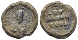 BYZANTINE LEAD SEAL. (21mm, 7.7 g) Obv: Bust of Saint facing. Rev: Legends in 3 lines.