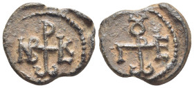 BYZANTINE LEAD SEAL. (22mm, 8.86 g) Obv: Cruciform monogram. Rev: Cruciform monogram.