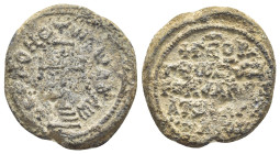 BYZANTINE LEAD SEAL. (21mm, 8.18 g) Obv: Circular legend Patriarchal cross set upon three steps. Rev: Legends in 5 lines.