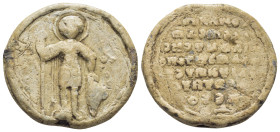 BYZANTINE LEAD SEAL. (29mm, 20 g) Obv: St. George(?) standing facing, holding spear and shield;. Rev: Legends in 6 lines.