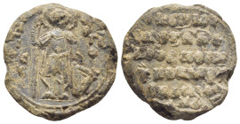 BYZANTINE LEAD SEAL. (24mm, 13.8 g) Obv: St. George(?) standing facing, holding spear and shield;. Rev: Legends in 5 lines.
