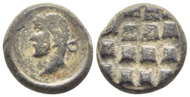 Lead Seal (19mm, 13.6 g) Obv: Laureate head left. Rev:?