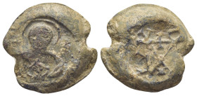 BYZANTINE LEAD SEAL. (22mm, 11.4 g) Obv: Bust facing. Rev: Cruciform monogram
