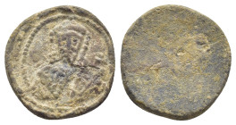BYZANTINE LEAD SEAL. (16mm, 4.0 g) Obv: Facing bust of Emperor, wearing crown and cuirass. Rev: Blank