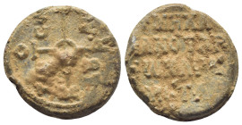 BYZANTINE LEAD SEAL. (21mm, 8.2 g) Obv: Cruciform monogram. Rev: Legends in 4 lines.