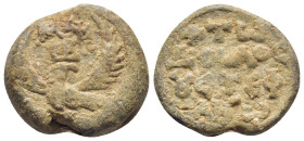 BYZANTINE LEAD SEAL. (22mm, 12.2 g) Obv: Eagle with uplifted wings and head turned to left. In field above head of eagle, cruciform invocative monogra...