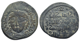 Artuqids of Mardin, Nasir al-Din Artuq Arslan Æ Dirham. (23mm, 7.3 g) Uncertain mint, AH 611 = AD 1214-1215. Facing male head wearing garment fastened...