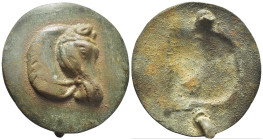 Bronze applique with horse head. (51mm, 30.1 g)