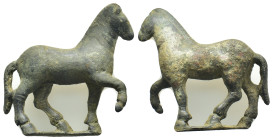 Bronze horse figurine. (54mm, 78,5 g) Bronze advancing horse, r; raising r. paw.