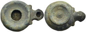 Bronze oil lamp with loop handle wide filling whole with circular border and long spout,with circular raised foot. (80mm, 99.2 g)
