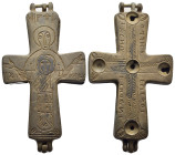 Byzantine Reliquary Cross Pendant. A large bronze enkolpion reliquary cross pendant comprising two hinged plates and an articulated suspension loop wi...