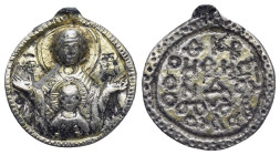 Byzantine silver pendant. half-length bust of the Virgin facing, orans, nimbate and wearing pallium with maphorium; bust of infant Christ with crucifo...