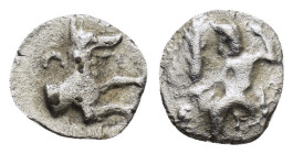 Obol AR
Lycaonia, Laranda, c. 324-323 BC, Baaltars seated left, holding grain ear, bunch of grapes, and scepter / Forepart of wolf right; inverted cr...
