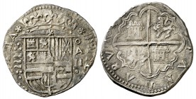 s/d. Felipe II. Valladolid. . 2 reales. (Cal. 588). 6,78 g. Flor de cinco pétalos al inicio y final de leyenda y entre escudo y corona. Armas de Fland...