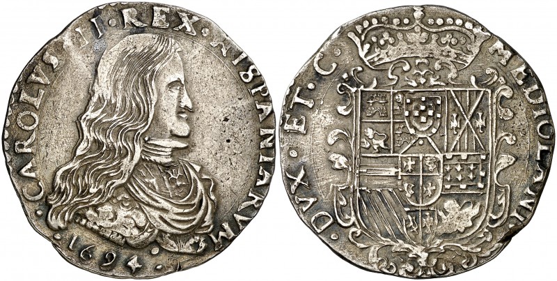 1694. Carlos II. Milán. 1 felipe. (Vti. 20) (MIR. 387/4). 27,37 g. Bajo el busto...