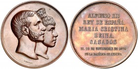 1879. Alfonso XII. Madrid. Boda con María Cristina. (V. 487) (V.Q. 14400). 230 g. Ø71 mm. Bronce. Grabador: G. Sellán. EBC+.
