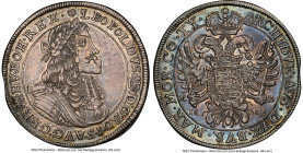 Leopold I Taler 1682-KB AU55 NGC, Kremnitz mint, KM205, Dav-3259. Interesting portrait with significant facial deformity. Beautiful iridescent toning ...