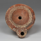 Roman factory oil lamp with makers mark, Type Bussière D II 1