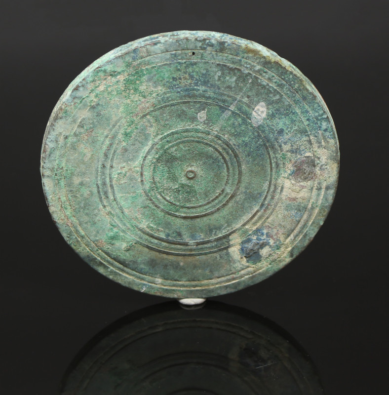 Roman mirror

ITEM: Mirror
 MATERIAL: Bronze
 CULTURE: Roman
 PERIOD: 1st -...