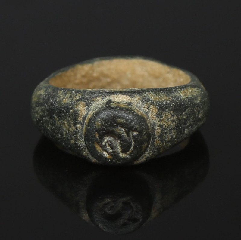 Roman ring depicting a dolphin

ITEM: Ring depicting a dolphin
 MATERIAL: Bro...
