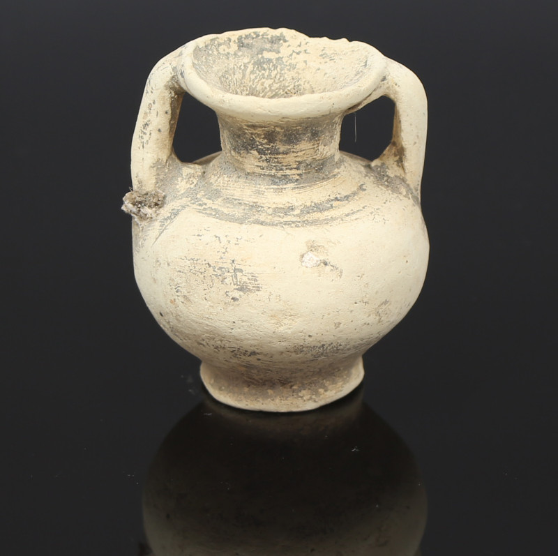 Greek miniature amphora

ITEM: Miniature amphora
 MATERIAL: Pottery
 CULTURE...