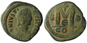 Justin I. (518-527 AD) Æ Follis. Constantinople. Obv: D N IVSTINVS P P AVG. diademed bust right. Rev: M between stars, cross above. artificial sandpat...