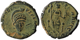 Honorius. (401-403 AD). Follis. Constantinople. Obv: DN HONORIVS PF AVG. helmeted bust of Honorius holding spear and shield facing. Rev: CONCORDIA AVG...