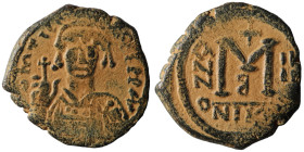 Maurice Tiberius. (582-602 AD). Follis. Nikomedia. Obv: bust of Maurice Tiberius facing. Rev: A/N/N/O M. artificial sandpatina. 29mm, 11,54g