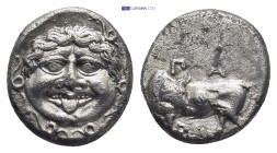 MYSIA, Parion. 4th century BC. AR Hemidrachm. (12mm, 2.3 g)Gorgoneion / ΠA–PI, bull standing left, head right; six-pointed star below.