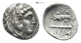Kingdom of Macedon, Alexander III 'the Great' AR Hemiobol. 'Babylon', circa 317-311 BC. (0.52 Gr. 9mm.) Head of Herakles right, wearing lion skin head...