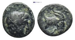 Aiolis, Aigai. Ca 3rd century B.C. AE (9mm, .9 g). Laureate head of Apollo to right / Head and neck of goat right