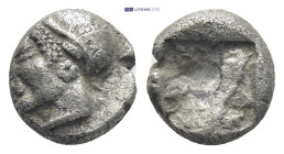 IONIA, Phokaia. Circa 625/0-522 BC. AR Obol (9mm, 1.2 g) Female/ Athena head left, wearing helmet or close fitting cap Rev: Incuse