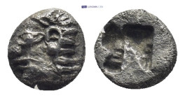 Ionia. Phokaia circa 500 BC. Tetartemorion AR (7mm., 0,43g). Archaic head of Athena(?) left / Four-part incuse punch.