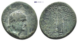 Aeolis, Aegae. Vespasian. A.D. 69-79. Æ (17mm, 5.2 g). Apollonios Nemeonikos, magistrate. Laureate head of Vespasian right / Apollo standing right, ho...