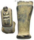 Bronze die with human body relief. (32mm, 23.49 g)