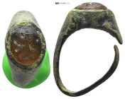 Bronze ring with amber color stone. (15mm, 5.2 g)