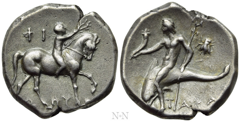 CALABRIA. Tarentum. Nomos (Circa 272-240 BC).

Obv: Nude youth crowning horse ...