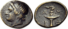 MACEDON. Amphipolis. Circa 355-353 BC. Chalkous (Bronze, 12.5 mm, 1.72 g, 7 h), struck under Philip II. Head of Apollo to left, wearing taenia. Rev. A...