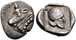 PHOKIS, Federal Coinage. Circa 420-400 BC. Hemiobol (Silver, 8 mm, 0.45 g, 9 h). Head of a bull to left. Rev. Corinthian helmet to right, within an in...