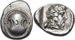 BOEOTIA. Thebes. Circa 425-395 BC. Stater (Silver, 24.5 mm, 12.07 g, 3 h). Boeotian shield. Rev. Θ-Ε Bearded head of Dionysos to right, wearing ivy wr...