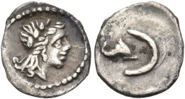 SPAIN. Uncertain mint. Circa 3rd century BC. Tetartemorion (Silver, 9 mm, 0.18 g, 12 h). Laureate head of Apollo to right. Rev. Dolphin swimming right...