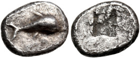 THRACIAN REGION. Uncertain city. Circa 500-450 BC. Obol (Silver, 8 mm, 0.50 g), an issue copying Thasos. Dolphin swimming, not leaping, to the right. ...