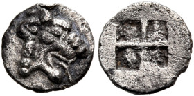THRACO-MACEDONIAN REGION. Uncertain mint. Circa 5th century BC. Tetartemorion (Silver, 6.5 mm, 0.15 g). Head of a roaring lion to right, with protrudi...