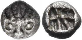 ASIA MINOR. Uncertain mint. 6th century BC. Obol (Silver, 7 mm, 0.69 g). Stylized lion's head facing, wearing a crown with five rays. Rev. Incuse squa...