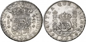 1769. Carlos III. Potosí. JR. 8 reales. (Cal. 969). 27,06 g. Columnario. 9 curvo. Marca de ceca entre tres puntos. Bella. Rara y más así. EBC.