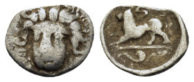 Italy. Southern Campania, Phistelia, c.325-275 BC. AR Obol (10,8 g, 0.55g). Head of nymph facing slightly to left. R/ Lion crouching to left; serpent ...